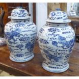 TEMPLE JARS, a pair, Chinese style, blue and white, 43cm H.