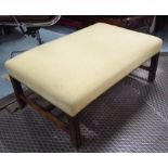 FOOTSTOOL, with an upholstered top and studded detail on a mahogany base, 62cm D x 90cm L x 41cm H.