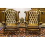 WING ARMCHAIRS, a pair, Georgian style tan leather with button backs and cushion seats, 86cm W.