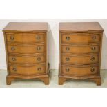 BEDSIDE CHESTS, a pair, Georgian style mahogany of slight serpentine outline with four drawers,