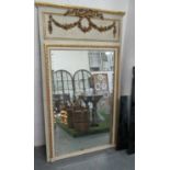 TRUMEAU MIRROR, bevelled plate with gilded swags and frame on a cream ground, 181cm x 104cm.