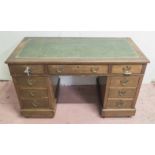 PEDESTAL DESK, Victorian mahogany the tooled inlaid green leather top over nine drawers,