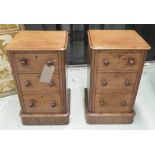 BEDSIDE CHESTS, a pair, Victorian mahogany, each with three drawers (adapted),