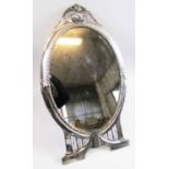 SILVER PLATED MIRROR, continental Art Nouveau style, 57cm H x 34cm W maximum.