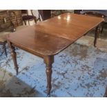 DINING TABLE, part Victorian, mahogany with two extra leaves on turned supports,