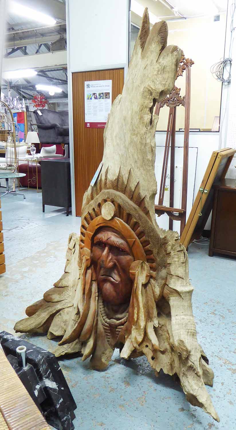 INDIAN CHIEF'S HEAD, carved from single piece of driftwood, 180cm H.