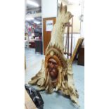 INDIAN CHIEF'S HEAD, carved from single piece of driftwood, 180cm H.