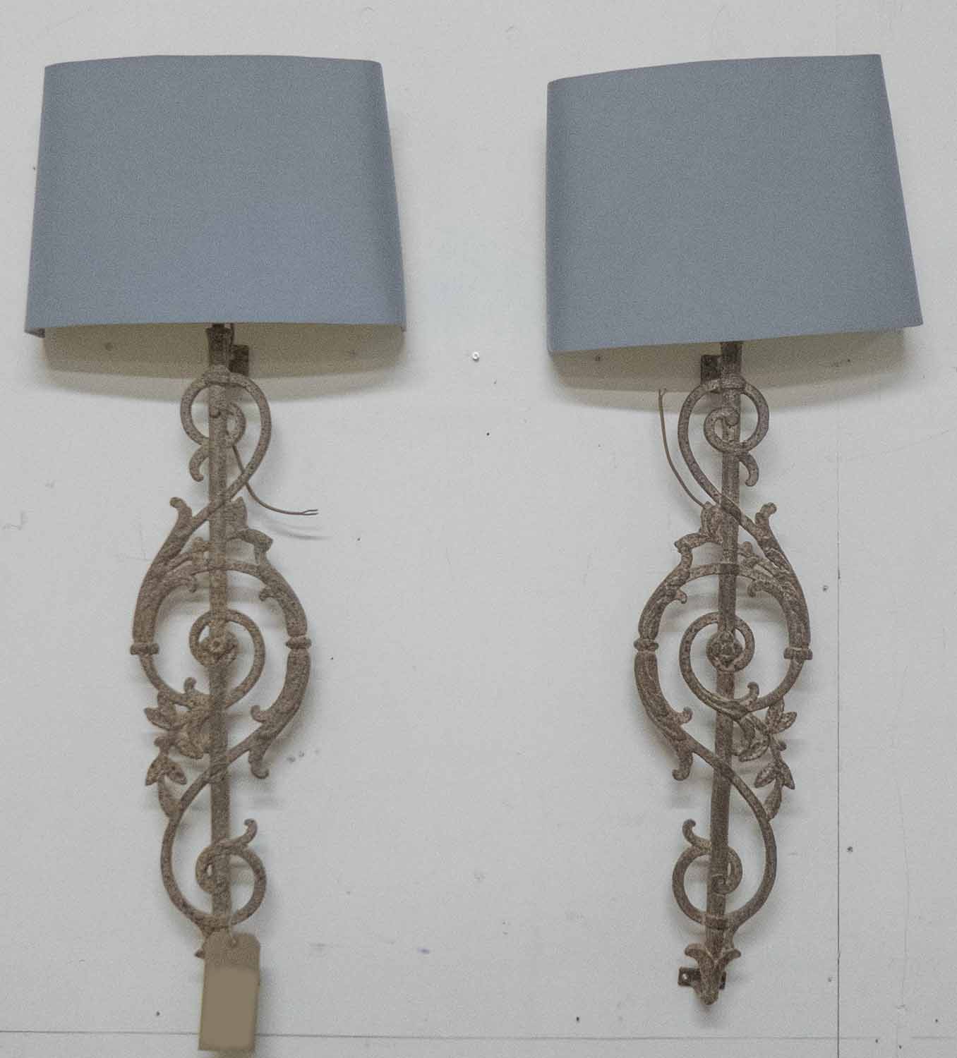 PAIR OF CAST METAL WALL LIGHTS, formed from balustrades and shades, 112cm H.