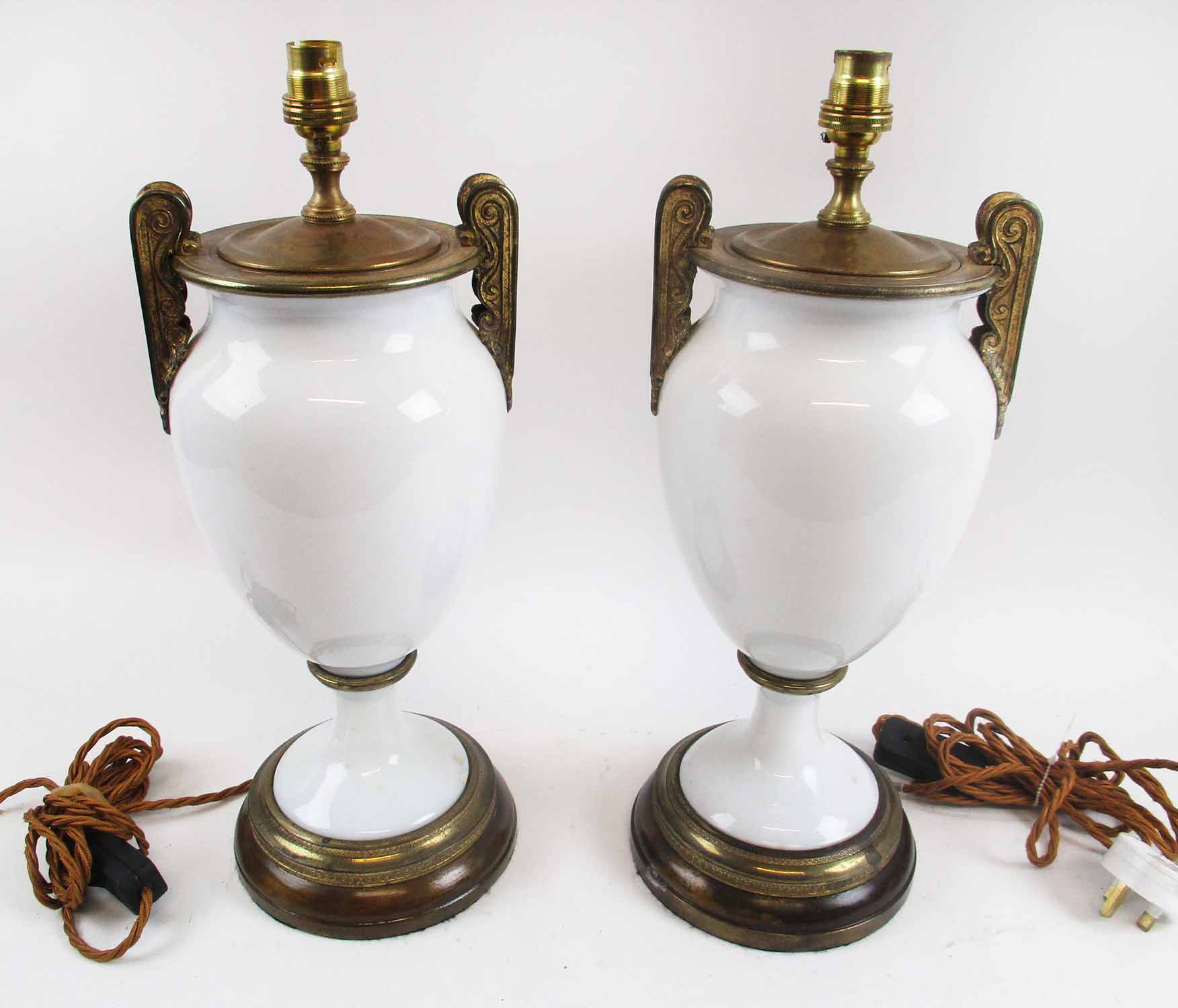 CLASSICAL STYLE TABLE LAMPS, a pair, white glass with gilt mounts, 38cm H.