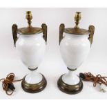 CLASSICAL STYLE TABLE LAMPS, a pair, white glass with gilt mounts, 38cm H.
