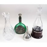 THREE VARIOUS DECANTERS, and a pewter wine funnel.