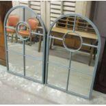 MIRRORS, a pair, green metal framed, each with an arched top, 79cm W x 122cm H.
