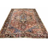 ANTIQUE HERIZ CARPET, 366cm x 262cm, Serapi design, central medallion on a palmette and vine,