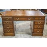 PEDESTAL DESK, Edwardian mahogany with tan leather top above nine drawers, 75cm H x 137cm x 71cm.