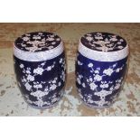 GARDEN SEATS, a pair, Chinese style blue and white with prunus blossom decoration,