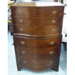 SERPENTINE TALL CHEST, mid 20th century mahogany with six graduated drawers,