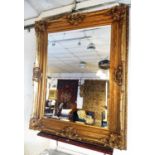WALL MIRROR, rectangular gilt framed of large proportions with a bevelled plate, 160cm H x 130cm W.