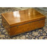 TRUNK, Colonial teak with crossbanded hinged top and brass side handles, 41cm H x 100cm W x 63cm D.