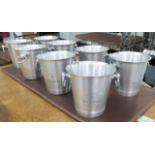 CHAMPAGNE BUCKETS, a set of eight, stamped Charles De Cazanove, 21cm H.