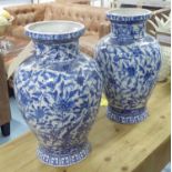 ORIENTAL VASES, a pair, Chinese style blue and white, 42cm H.