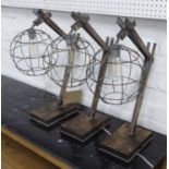 SIDE LAMPS, a set of three, in a steam punk inspired design, 52cm H.