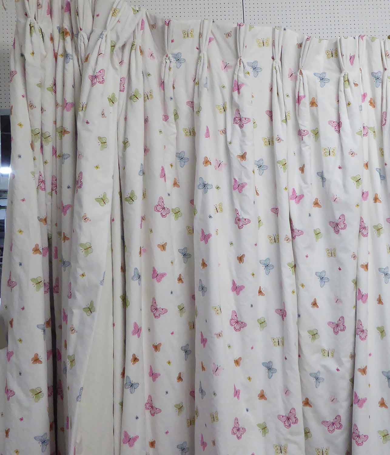 JANE CHURCHILL FLUTER BY FABRIC CURTAINS, a pair, 140cm gathered by 240cm drop.