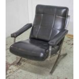 ARMCHAIR, mid 20th century, in black leatherette on steel supports, 74cm W.