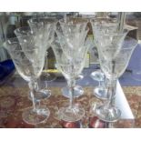 SWEDISH WINE GLASSES, a set of nine, the large bowls with entwined foliate decoration, each 22.
