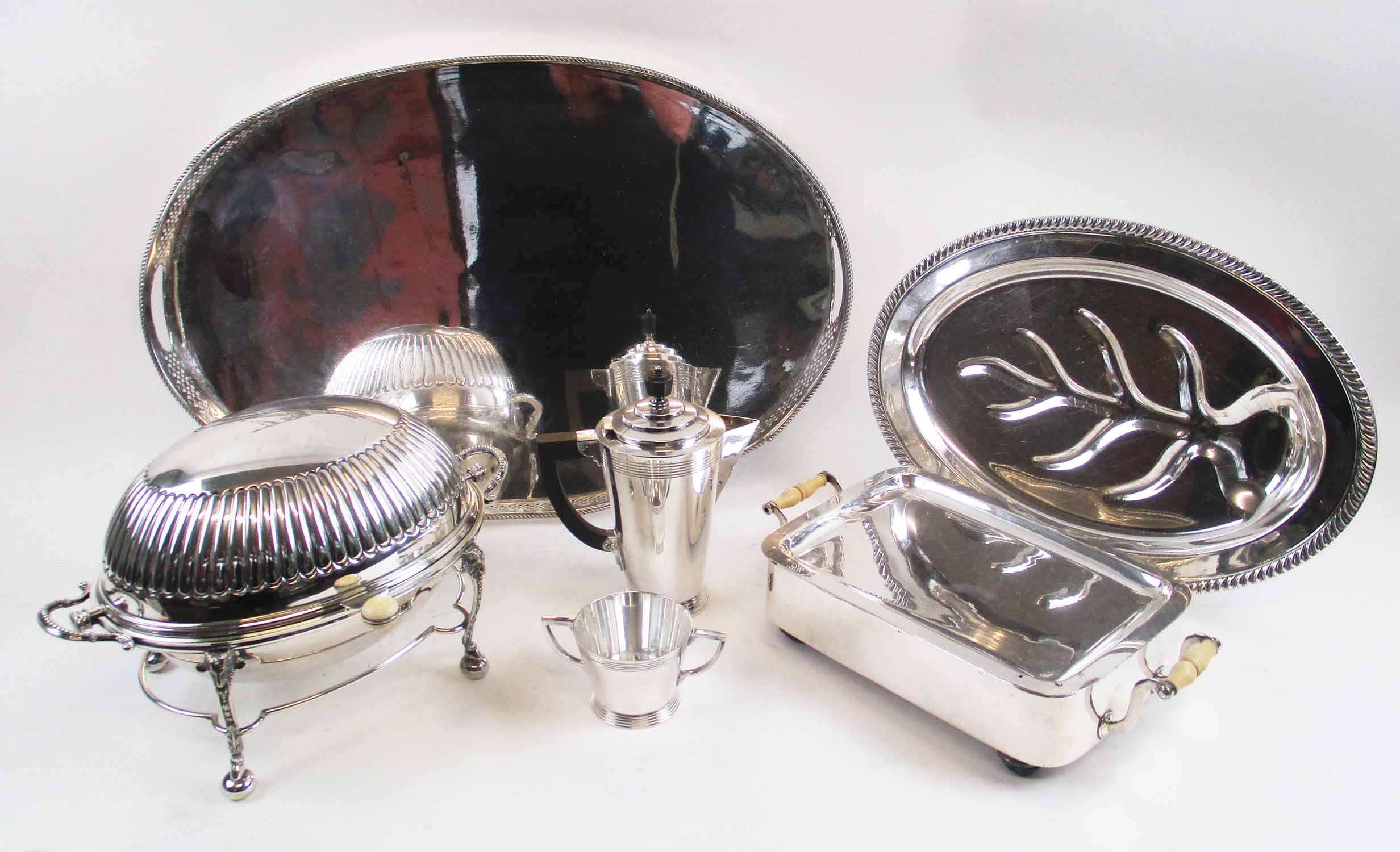 SILVER PLATED WARES, comprising a serving tray, Deco coffee pot and sugar bowl, heated dish,