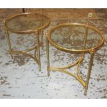 LOW OCCASIONAL TABLES, a pair, gilt metal framed, each with a circular glass top,