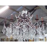 CHANDELIER, twelve branch on metal frame with glass drops, 56cm H plus chain.