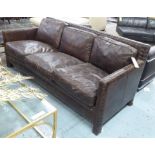 SOFA, three seater, dark brown leather with studded detail, 200cm L x 93cm x 80cm H.