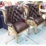 WING BACK ARMCHAIRS, a pair, buttoned back brown leather, deconstructured frames.