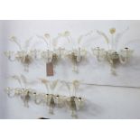 MURANO WALL SCONCES, a set of seven, floral and foliate design, two in a milky finish,