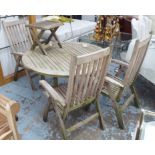 GARDEN TABLE, circular, in weathered teak, by Barlow Tyrie,