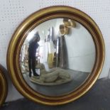 BUTLERS MIRROR, in gilded frame, 79cm diam.