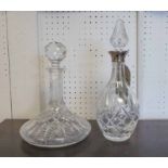 A CUT GLASS DECANTER WITH SILVER COLLAR, 32cm H,