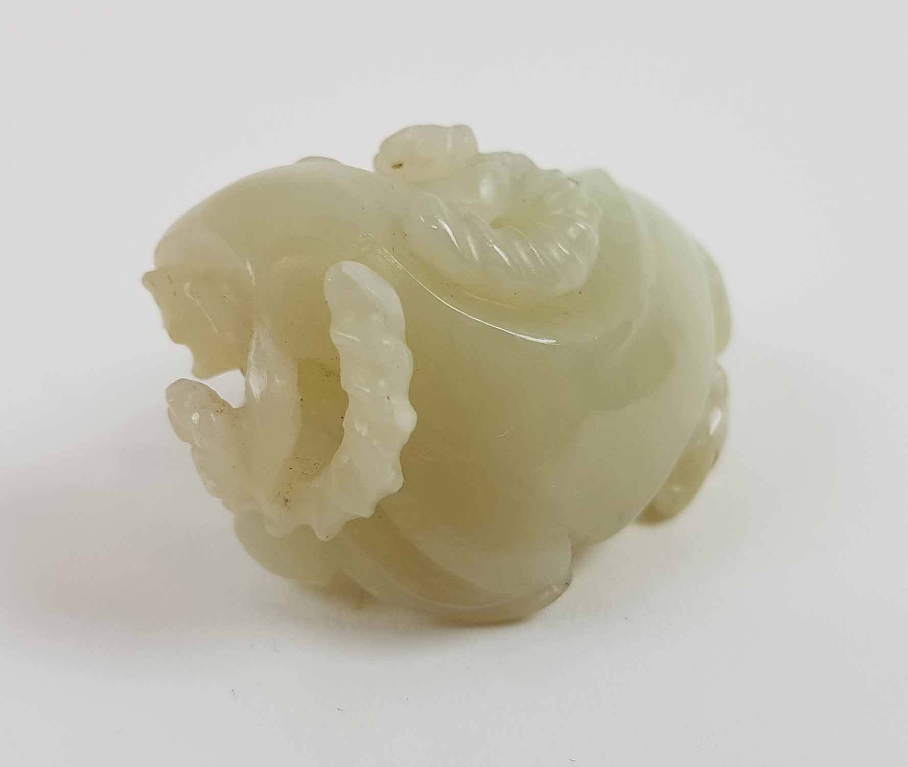 A CHINESE PALE CELADON COLOURED JADE FIGURE, of a recumbent ram, 6cm Long. - Image 2 of 4