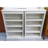 BOOKCASES, a pair, grey painted with adjustable shelves, 75cm W x 29cm D x 109cm H.