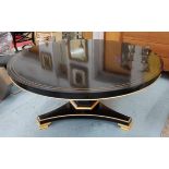 BREAKFAST TABLE, Regency style, ebonised with brass inlayed to top, gilt detail, 163 Diam.