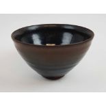 BOWL, a Jian Hares fur blackish persimmon glazed conical shaped,possibly Song dynasty (960-1279),