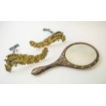 CURTAIN TIE BACKS, a pair, early 19th century Ormolu bronze ,