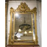 WALL MIRROR, late 19th/early 20th century French giltwood with cushion marginal bevelled plates,