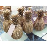 PINEAPPLES, a set of five, in gilt finish in resin, 30cm H.