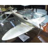 MODEL AIRCRAFT OF A SPITFIRE, in aluminium cladding, 74cm x 58cm x 43cm H.