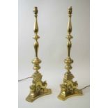 BRASS ITALIAN CANDLESTICK LAMPS, a pair, 68cm H.