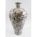 CHINESE CERAMIC VASE, of inverted baluster form, decorated in all-over design of chasing dragons,