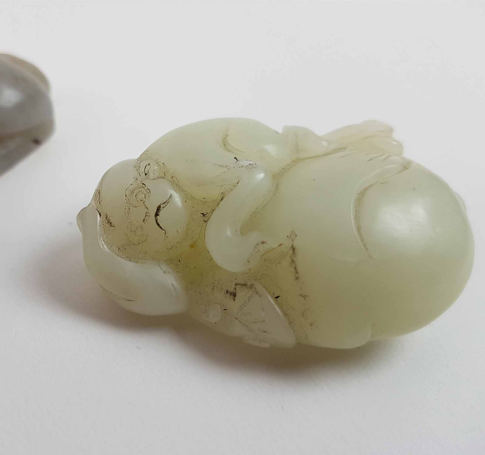 A CHINESE DALE CELADON COLOURED JADE MONKEY AND GOURD and a greyish coloured Jade recumbant lion, - Image 2 of 4