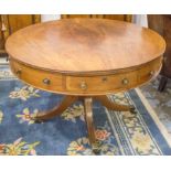 DRUM TABLE, Regency mahogany with four real and four dummy drawers on turned pedestal,