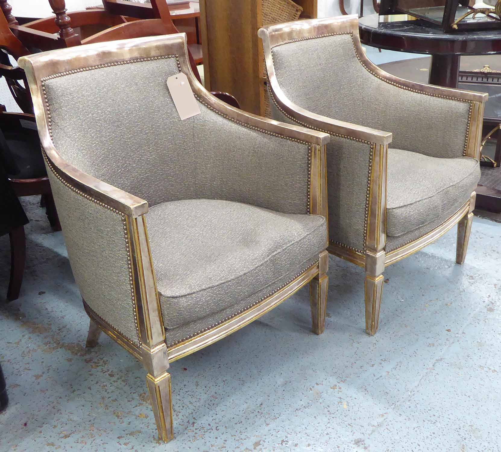 ARMCHAIRS, a pair, in a grey fabric on silver painted frames, 66cm W.